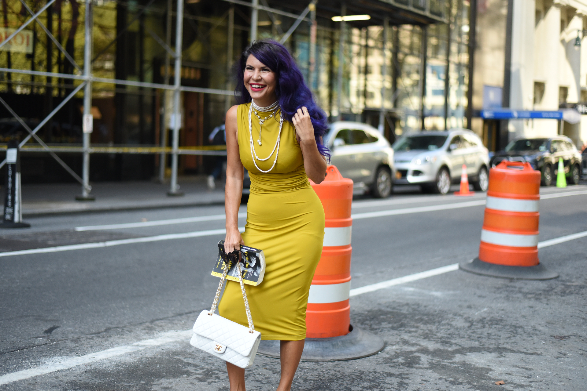 Devon Ryan Johnson in a yellow dress on a New York City street