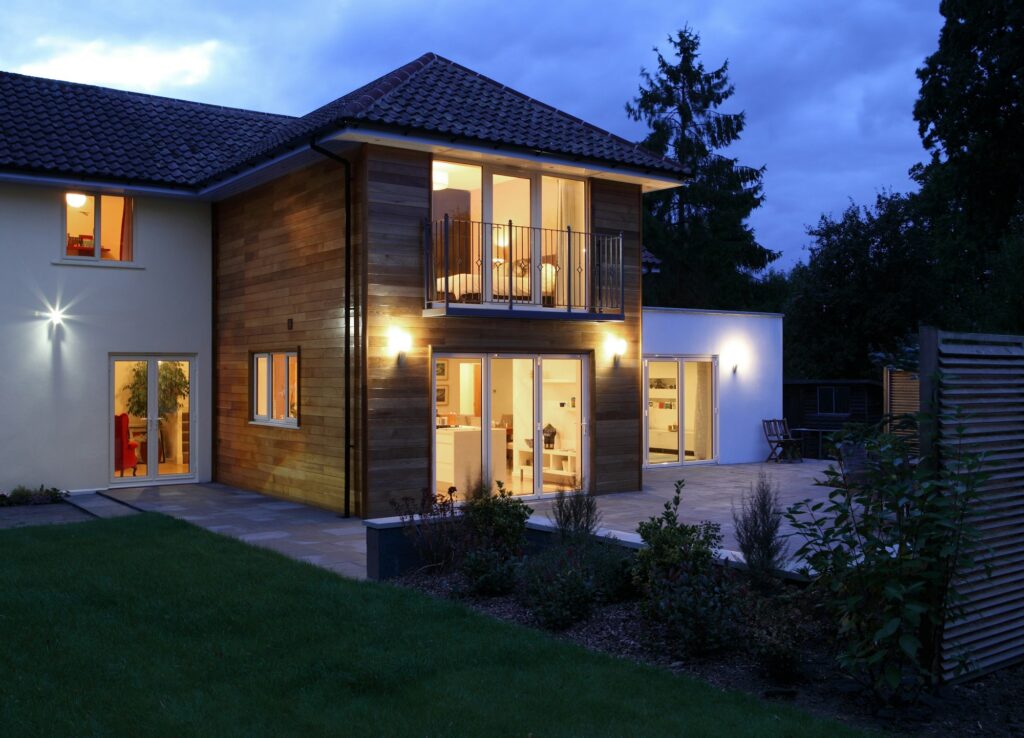 Large house illuminated in the evening